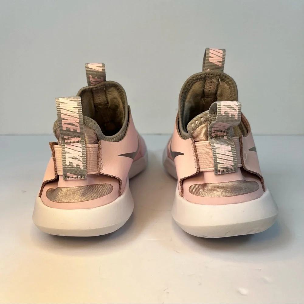 Nike Pink‎ Slip-On Sneakers with Streamlined Design